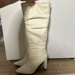 White knee high boots